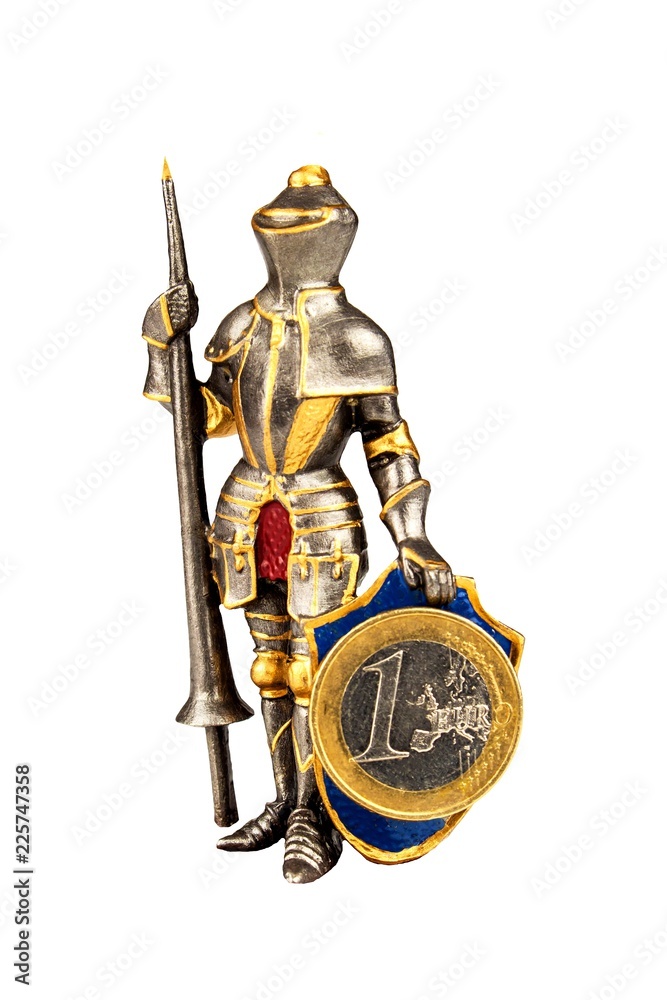 Metal knight figurine holding euro coins isolated on white. Defense of Europe. The common European currency. Medieval Knight. Metal knight figurine holding euro coins isolated on white. Defense of Europe. The common European currency. Medieval Knight.