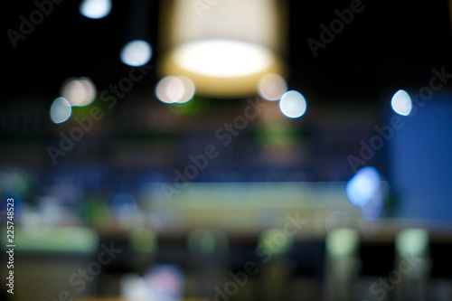 Defocused view of bar counter. Blurred background of restaurant.