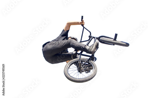 bmx biker performing a jump isolated over white