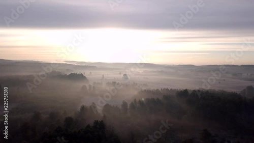 4k aerial with foggy morning on autumnal meadow. 3840x2160, 30fps. photo