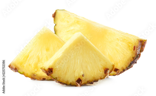 Fresh pineapple slices isolated on white background