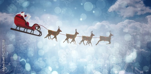 Composite image of side view of santa claus riding on sleigh