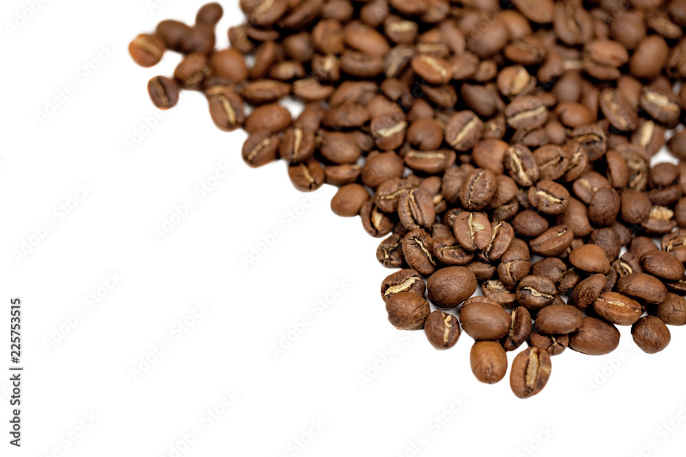 Naklejka premium Coffee beans close-up on white background