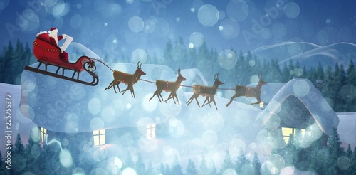 Composite image of side view of santa claus riding on sleigh photo