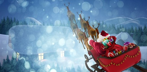 Composite image of high angle view of santa claus riding on sled
