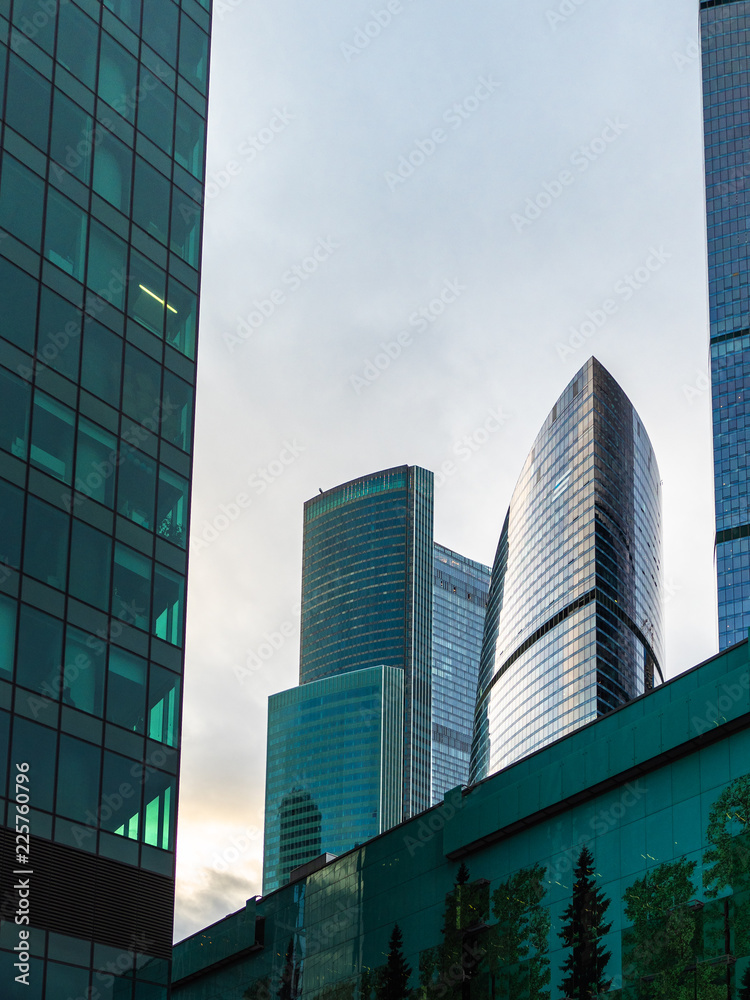 glass skyscrapers in Moscow city in autumn dusk