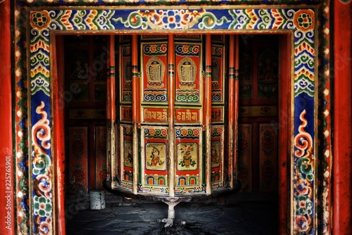 Photography tibetan buddhist prayer wheel with beautiful decoration