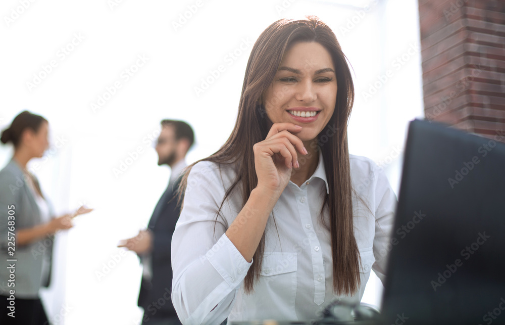 business woman working on laptop in office business woman working on laptop in office