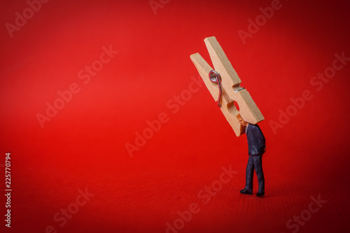 Businessman Clothespin Headache