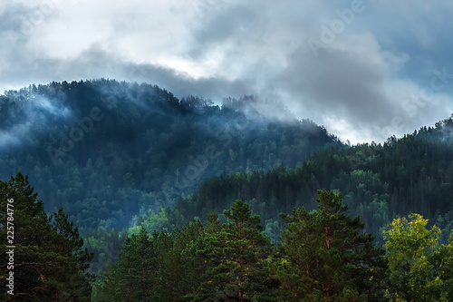 Fog on mountain tops. Mountain Altai