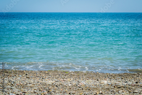 Jebha island and waves and rocks
