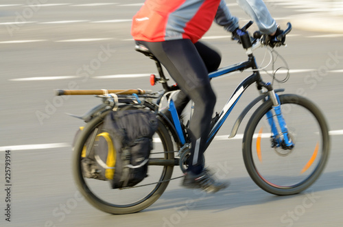 Cyclist rides on the road. photo