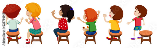 Children sitting on chairs