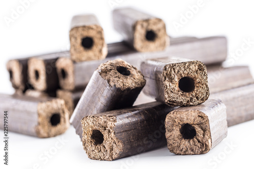Obraz na płótnie Wooden pressed briquettes Pini Kay from biomass.