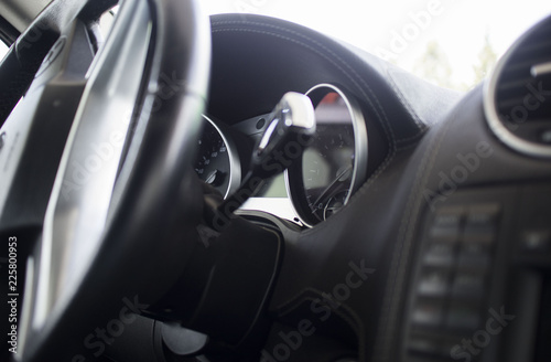 Interior of premium sedan car. steering wheel and dashboard of the car © Igorzvencom