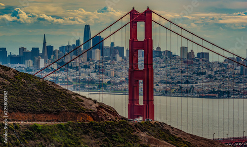 Golden Gate Bridge and downtown business district of San Francisco an marina green seen through the north tower of the Golden Gate Bridge