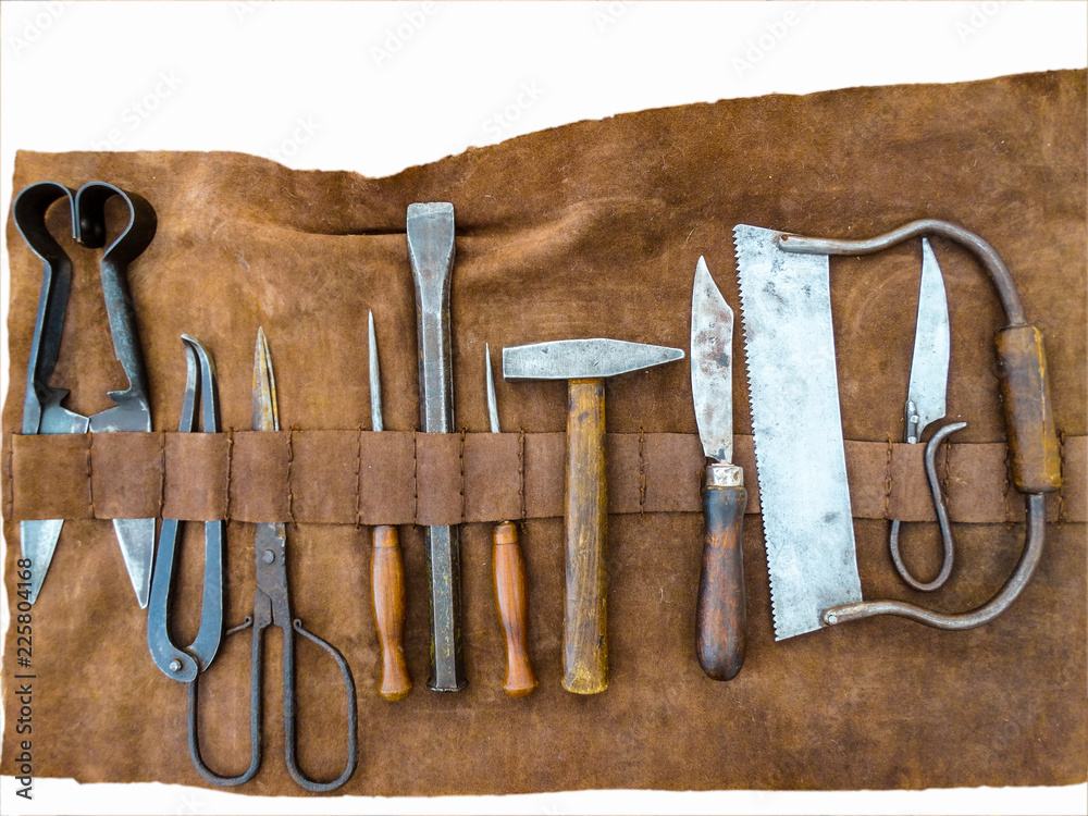 Medieval medical surgery tools wrapped in leather Stock Photo | Adobe Stock