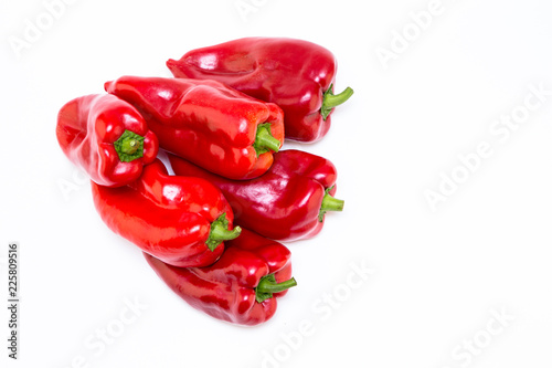 Red pepper on white background. Natural farm product. Image for cafe advertising, food.