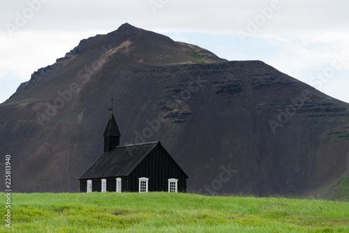 Black Church in the village of Budir, Iceland photo