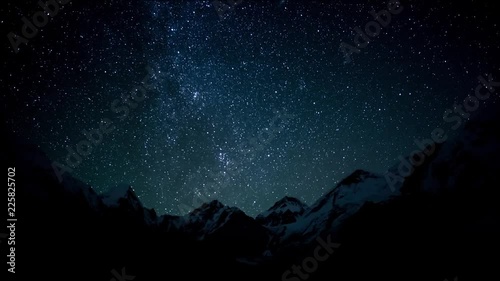 Timelapse of The movement of the stars in the night sky over Everest. Nepal. Himalayas. 4K photo