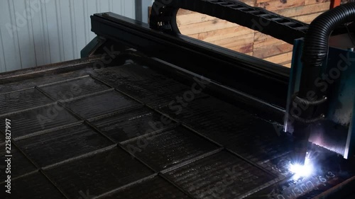 time lapse of plasma cutter. Plasma robotic industrial equipment works with metall sheet.