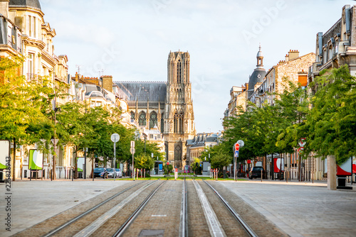 Street view with cathedral in Reims city, France photo