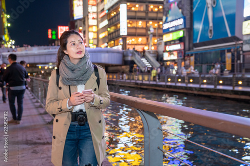 photographer relaxing walking around the river photo