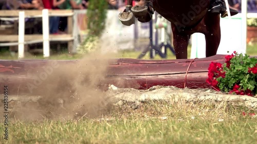 rider with horse, jumping a hurdle. Equestrian Sports. Slow motion
