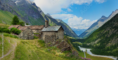 alpine old architecture with mountain river in Rhemes, Notre Dame