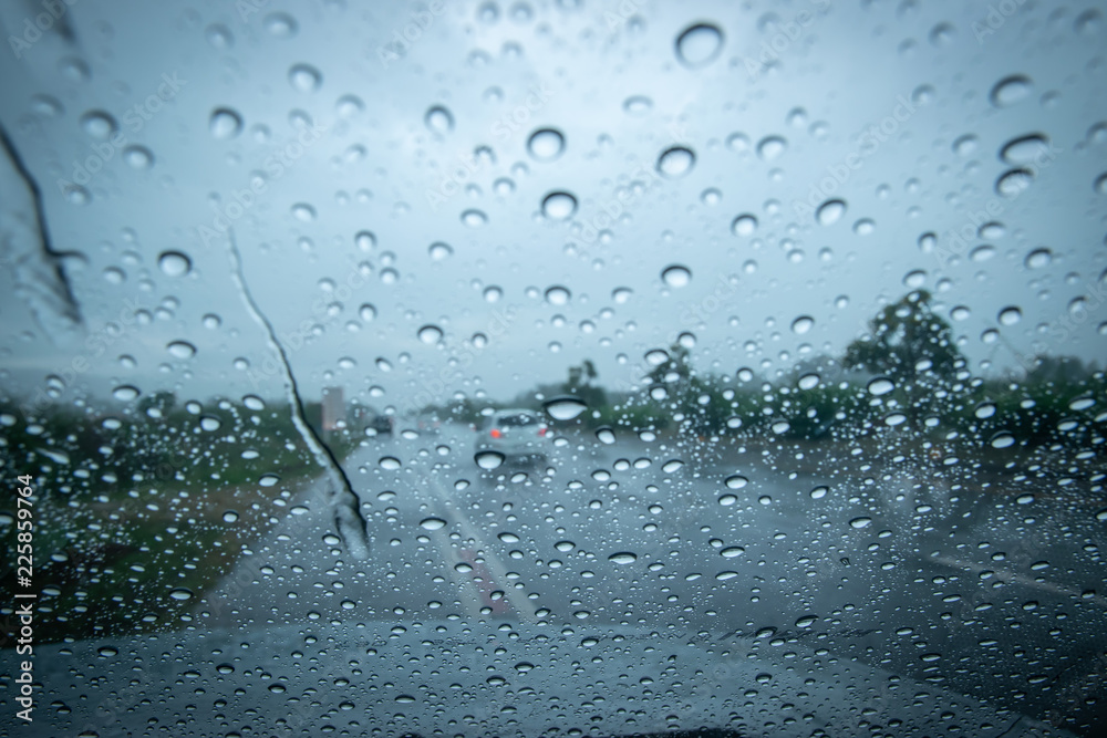 Raining really hard Not be able to continue driving, Rain drops on car  window in rainy season Stock Photo | Adobe Stock