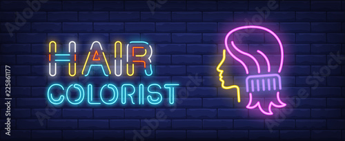 Hair colorist neon text and comb combing woman hair. Style, fashion and advertisement design. Night bright neon sign, colorful billboard, light banner. Vector illustration in neon style.