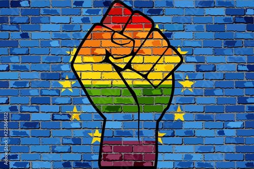 Fototapeta Pięść protestacyjna LGBT na flagi Europy z cegły - ilustracja, flaga Unii Europejskiej z cegły i flagi gejów