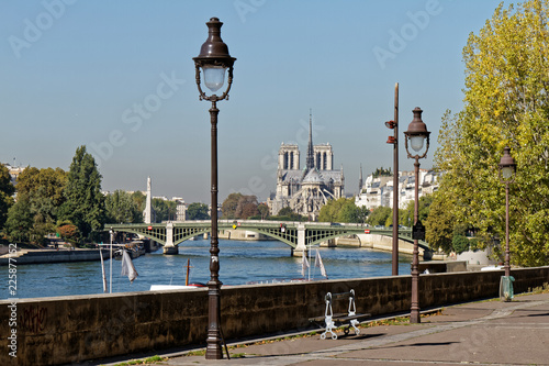 Sully bridge and Notre-Dame cathedral - Paris, France photo