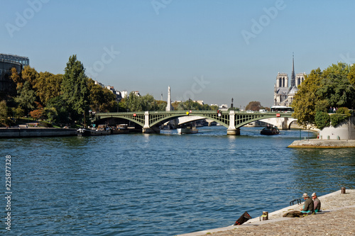 Sully bridge and Notre-Dame cathedral - Paris, France photo