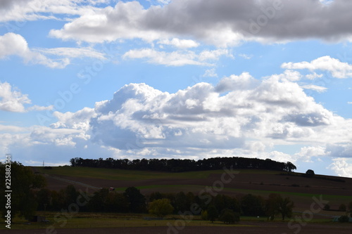 glühende Wolken über der Eifel photo