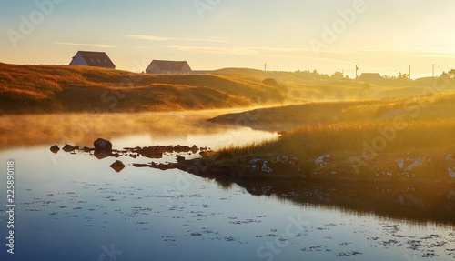 Sunset at Lochmaddy on Isle of North Uist, outer Hebrides, Scotland photo