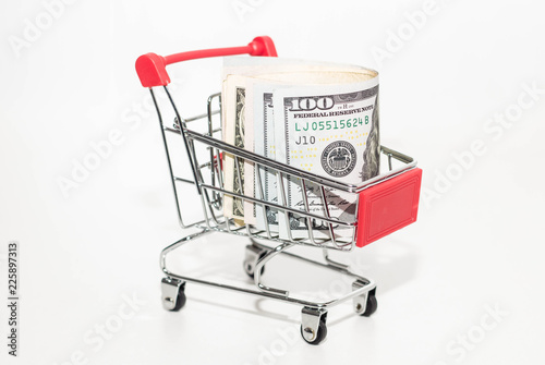 Iron shopping basket with money. Food basket