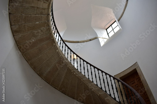 Triple helical stone staircase to the top and lookout. San Domingo de Bonaval, Santiago de Compostela, Spain. photo