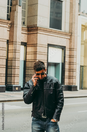 Man talking on the phone on the street of Chicago