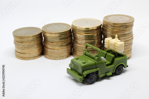 Toy Military Vechile with Turkish Liras. Economy related photo. War related photo. photo