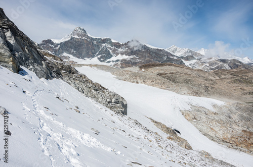 View of Seewjinengletscher glacier in Monte Rosa massif. Schwarzberghorn mount at background. Switzerland