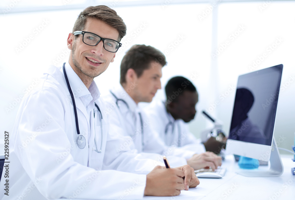 group of doctors conducting laboratory studies group of doctors conducting laboratory studies