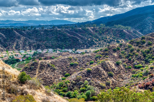 Houses next to forest and flood zone in California