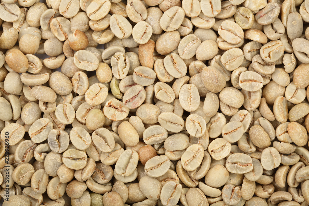 green coffee beans background close up. Top view green coffee beans background close up. Top view