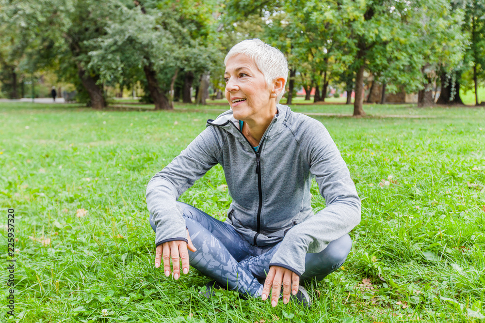 Obraz premium Senior Woman Relax After Exercise In Nature