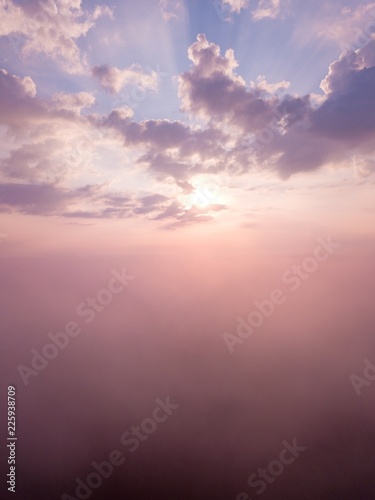 Beautiful foggy sunrise landscape from drone.