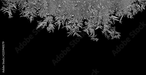 Natural ice crystals frostwork on dark backround. Macro closeup.