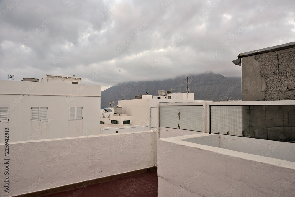 clouds like a quilt covered the mountain and coastal spanish village clouds like a quilt covered the mountain and coastal spanish village
