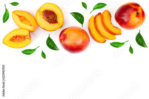 ripe nectarine with leaves isolated on white background with copy space for your text. Top view. Flat lay pattern