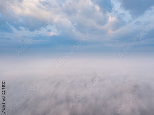 Beautiful foggy sunrise landscape from drone.